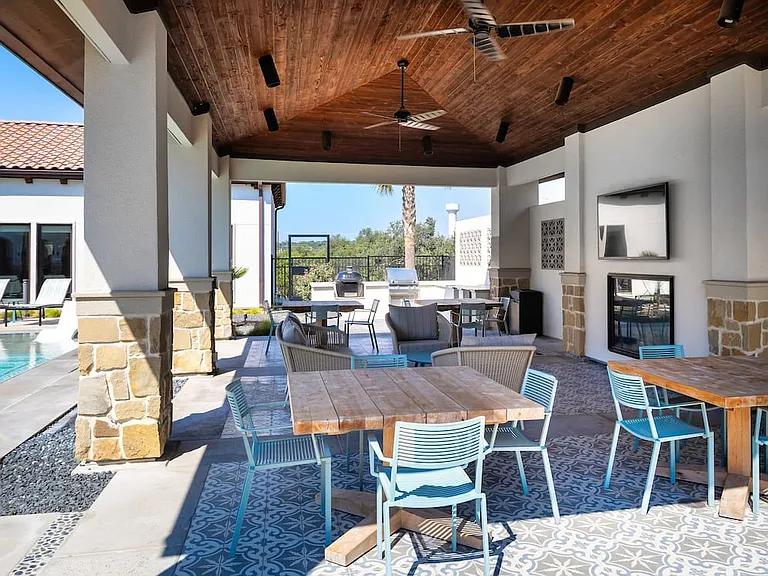 Outdoor lounge with BBQ grills and picnic areas