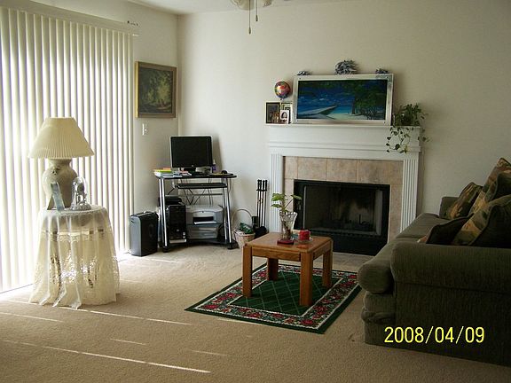 Familyroom features ceramic surround Fireplace