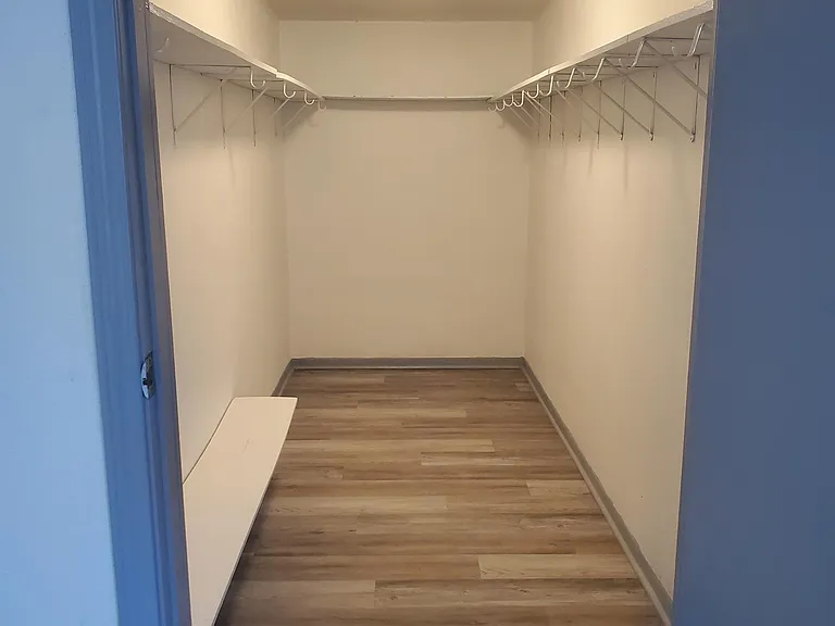 Extra large walk-in closet for main bedroom