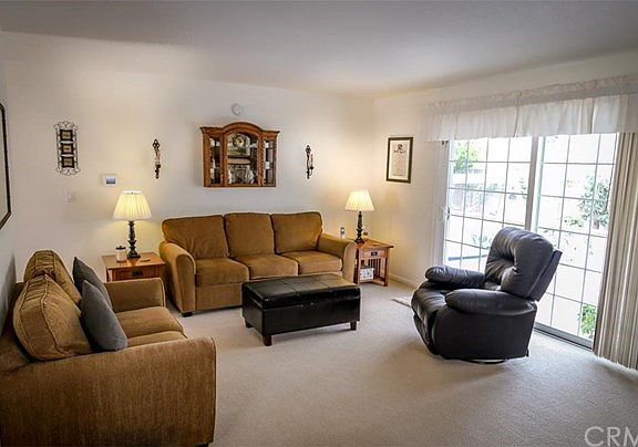 Neutral paint & scraped ceilings throughout helps you make this your own. Original wood floors under