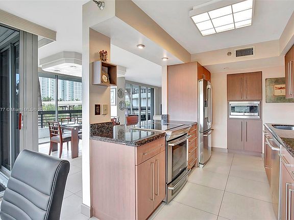 5th image of 3500 Mystic Pointe Dr APT 304
