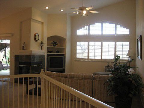 Beautiful Large Windows with Custom Plantation Shutters