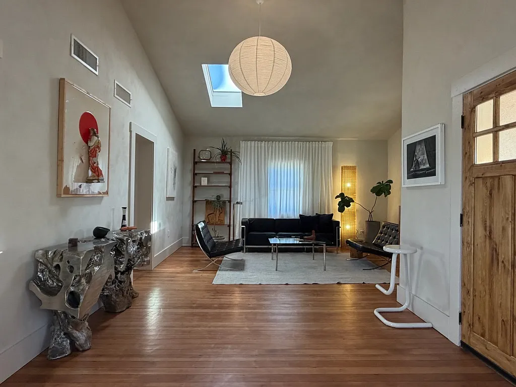 Large grand room with wood floors, high ceilings and skylight - 921 S 8th Ave