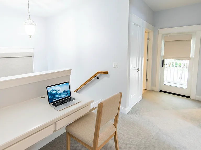 There is a built in desk perfect for a workstation.