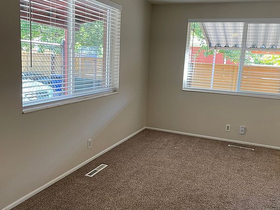 Double pane window to parking area from Living room.