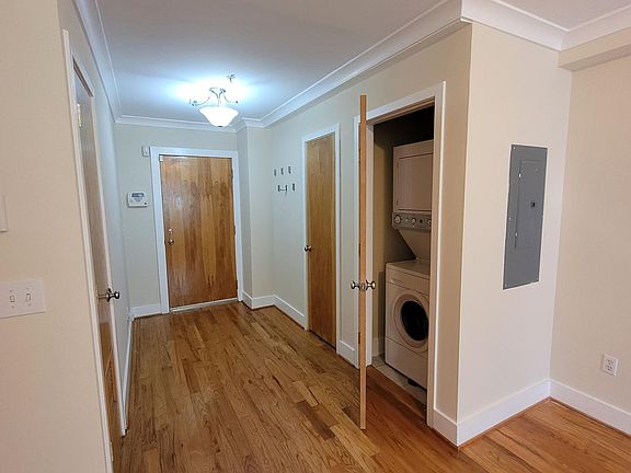 In 2021 - In-unit washer and dryer. Space for shoes, hats, jackets, and the like.