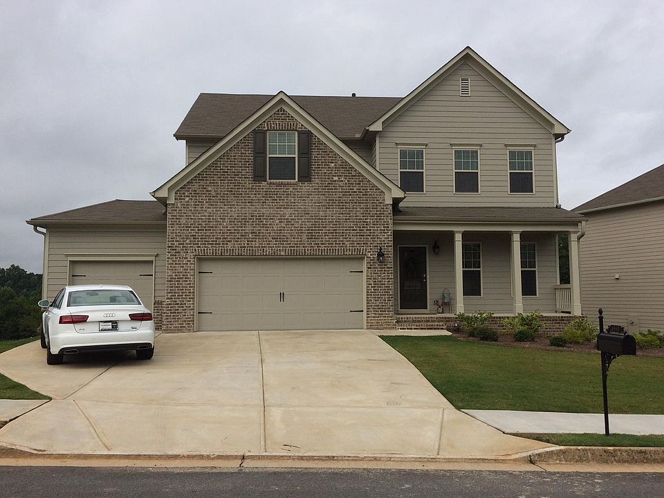 Beautiful lake front home with 3 car garage and finished bas