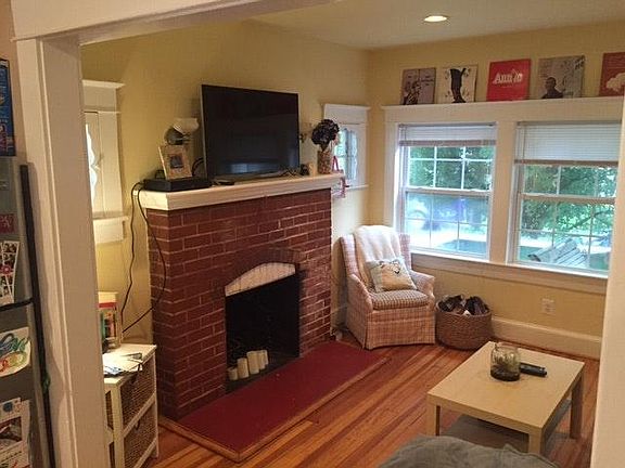 Facing towards front door, working fireplace