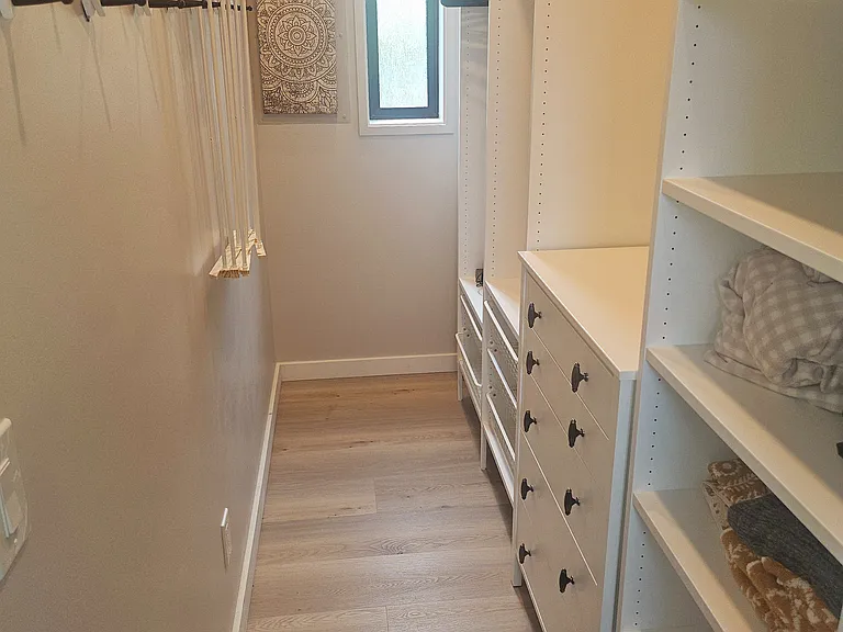 Large walk-in closet with lots of storage