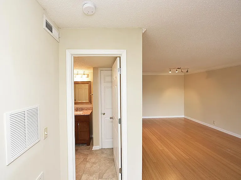 Step into this bright and welcoming apartment featuring spacious living with sleek hardwood flooring.