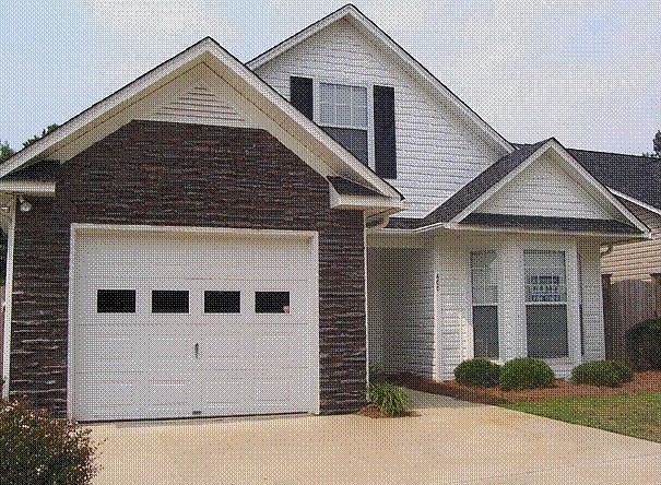 Front of house (vinyl and stone)