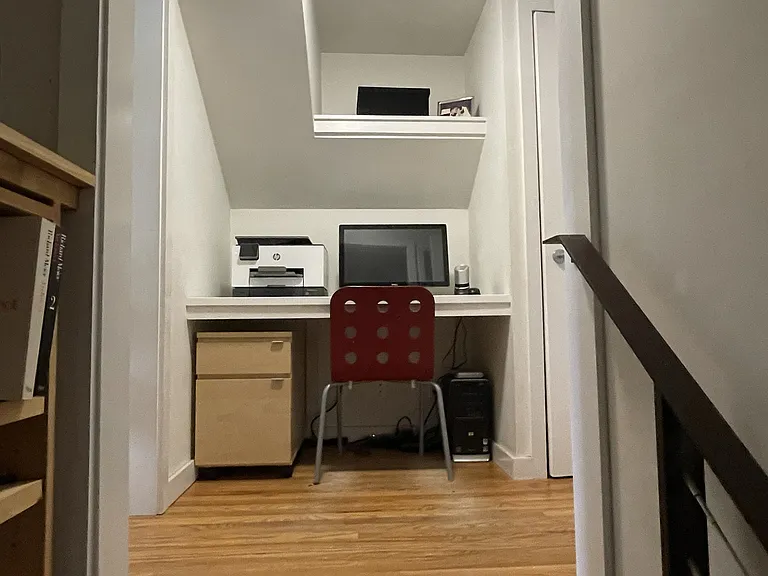 Built-in desk at top of stair