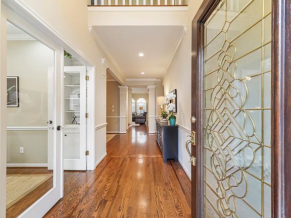 BEAUTIFUL WOOD FLOORING GREETS YOU AS YOU STEP IN TO YOUR NEW HOME