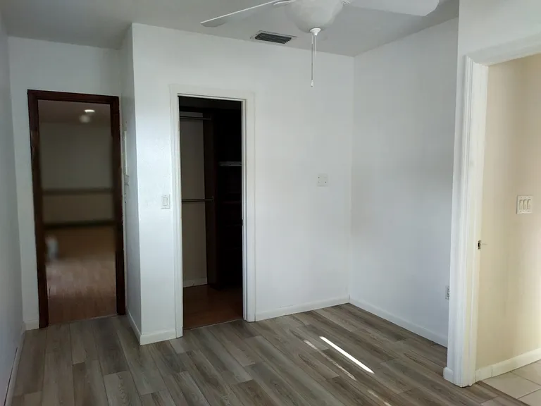 Bedroom 2 / office with walk in closet.