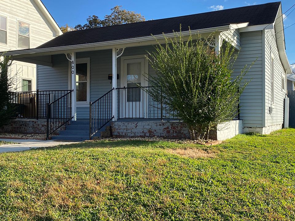 Sweet little blue Five Points house on a hill!