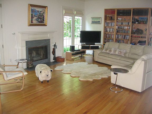 Family Room w/Woodburning Fireplace & 10 ft ceilings