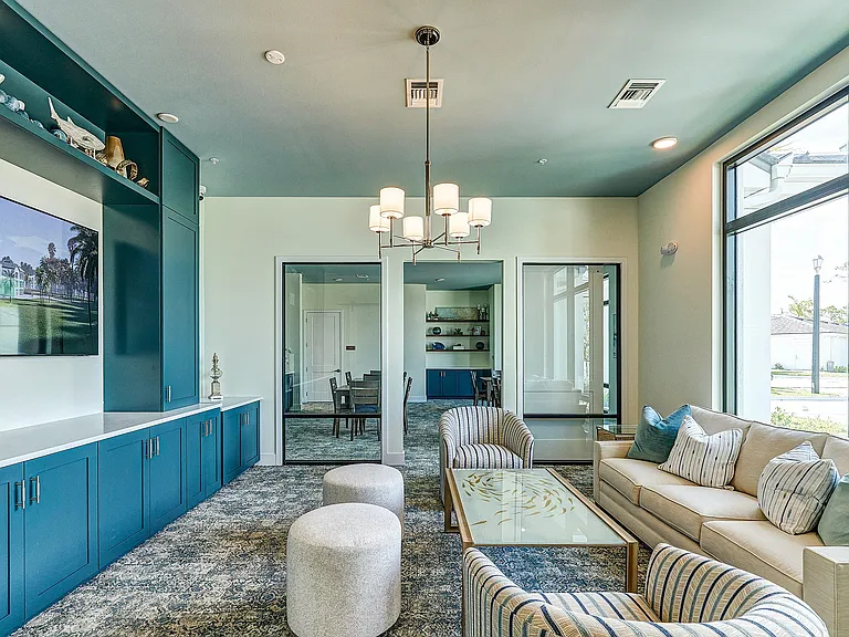 Imperial Crossing Luxury Apartment Homes community clubhouse seating area.