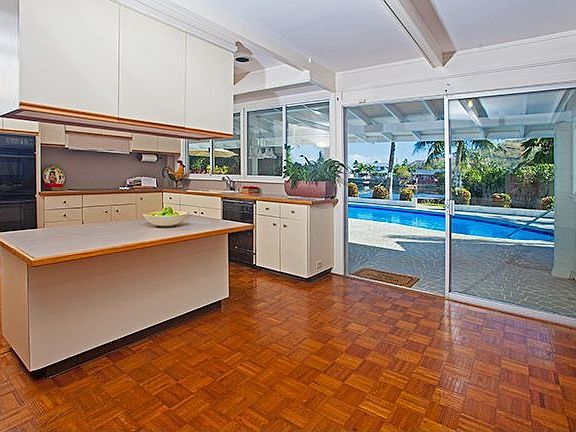 Spacious kitchen with bar area