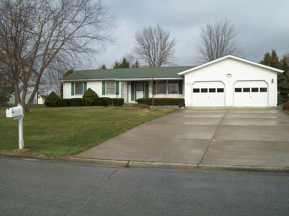 Paved driveway, large garage