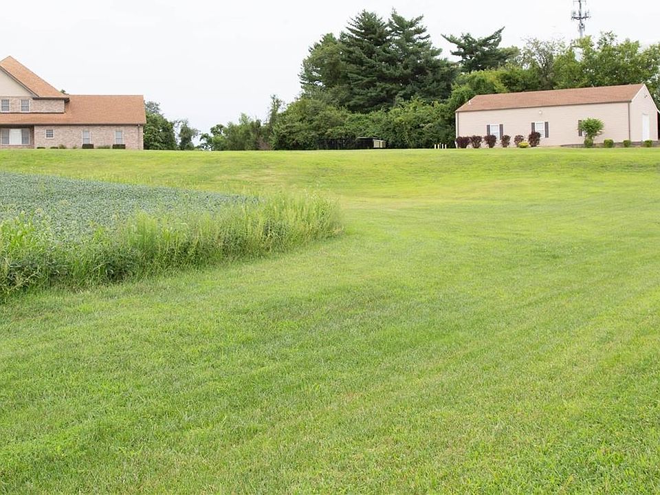 Welcome to 14620 Old Halls Ferry Road. This 4305 sq ft 1.5 sty with 40 x 56 outbuilding sits on 5.99 acres.