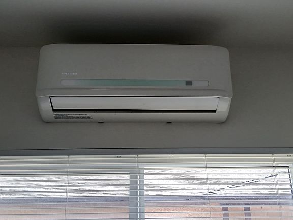 Living Room: Mini split heat and air with remote control.