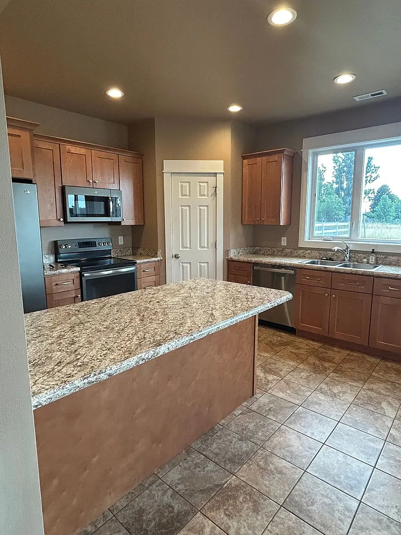 Rare Horse Property in Billings Heights 4BD Home on 2 Irrigated Acres! — Photo 1