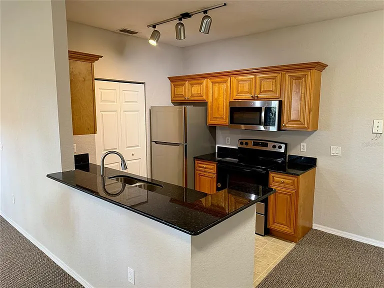826 Grand Regency Point #203 — Photo 5