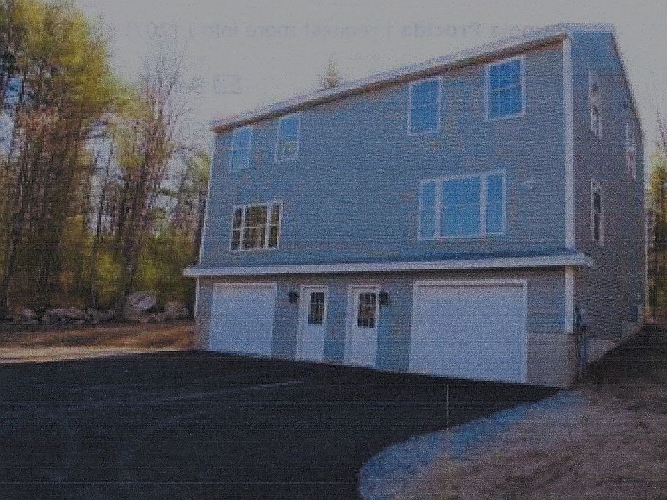 Towhnouse with 1 Bay Garage plus additional parking