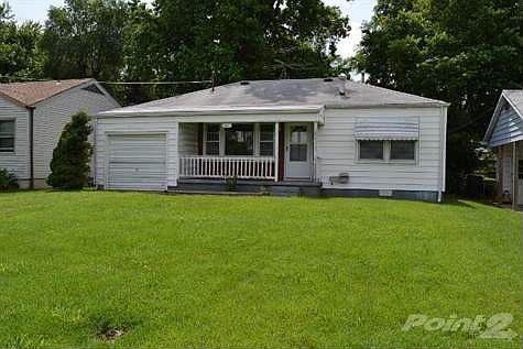 Check out the very spacious front yard. The backyard is even more nice!