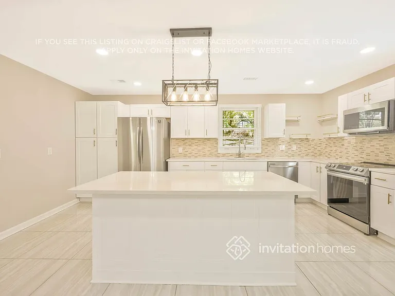4856 Torbay Dr — Photo 7