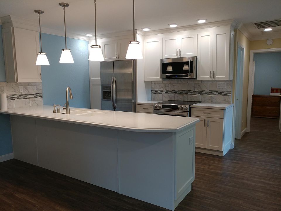 Kitchen includes top of the line stainless steel appliances