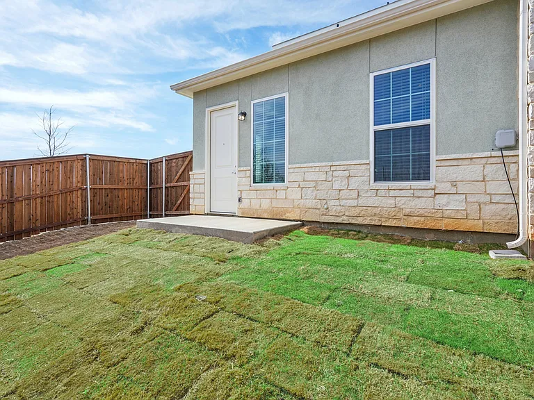 Backyard with wooden fence