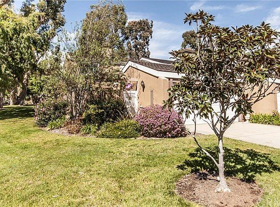 Surrounded by beautiful landscaping