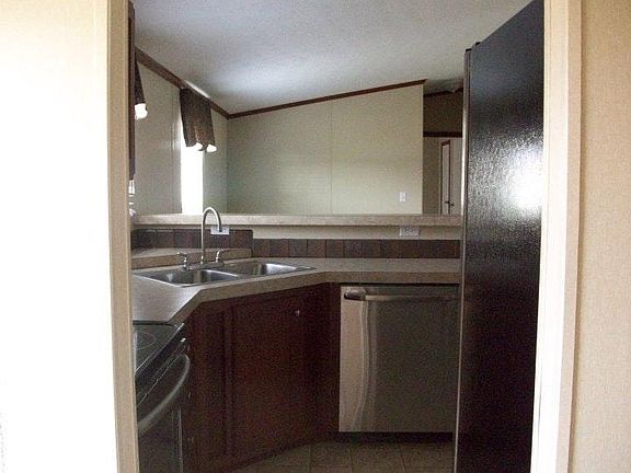 Kitchen view. Looking into great room.