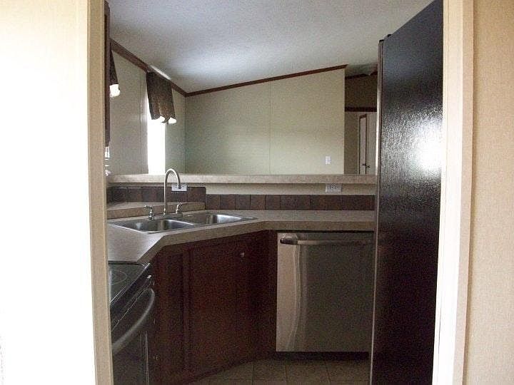 Kitchen view. Looking into great room.