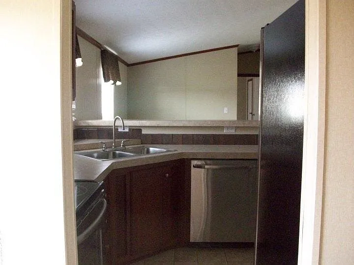 Kitchen view. Looking into great room.