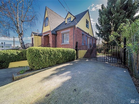 RV parking with a gated entrance to backyard