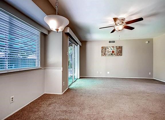 Large windows by dining area allows natural light to shine in.
