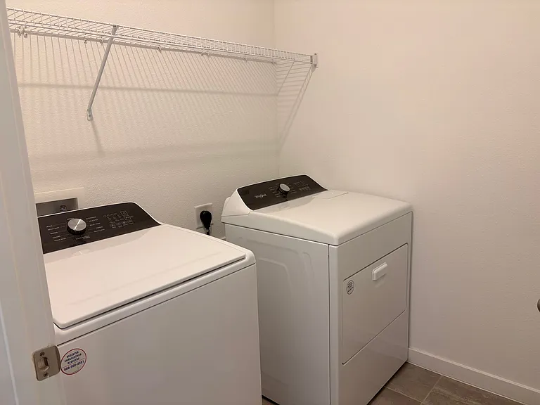 Laundry Room with washer and dryer included.