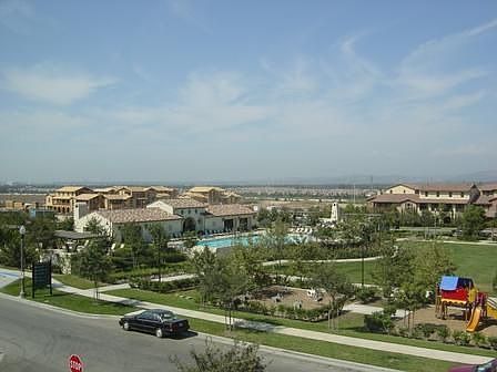 Looking North: View from 2nd floor deck (community park, pool fitness center)