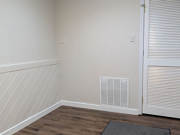 Bedroom Two with exit to back parking lot.