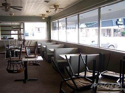 Lots of space for Dining - lots of natural light! Ceiling fa
