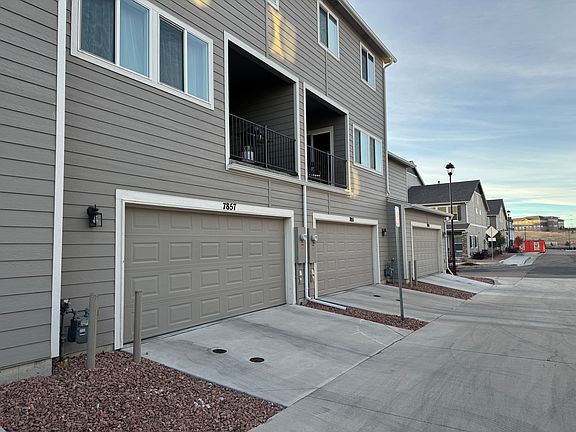 Two car attached garage leads into the bonus room/office area