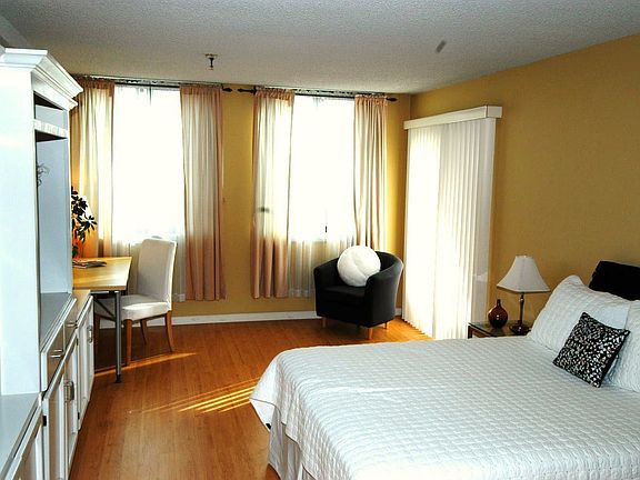 Bedroom - dual pane windows, also exits to outside patio