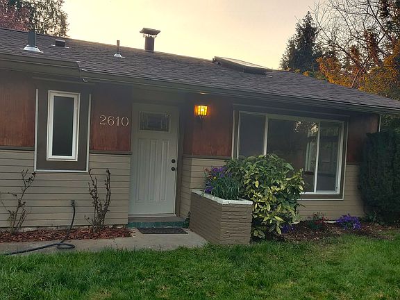 Entrance; 5 year young roof; stained cedar siding