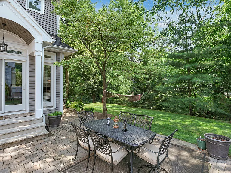Spacious Backyard with Hardscaping Throughout