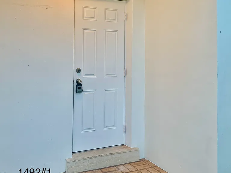 private entrance to laundry room and kitchen.