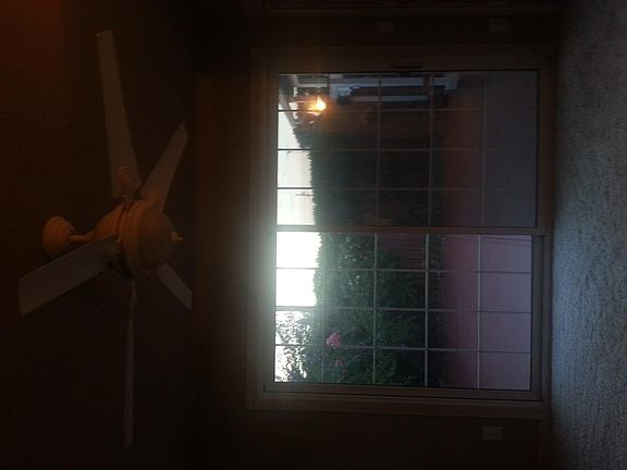 Sliding glass door & ceiling fan in second living room