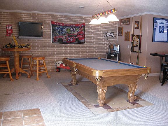 Rec area in basement, custom floor tiling 