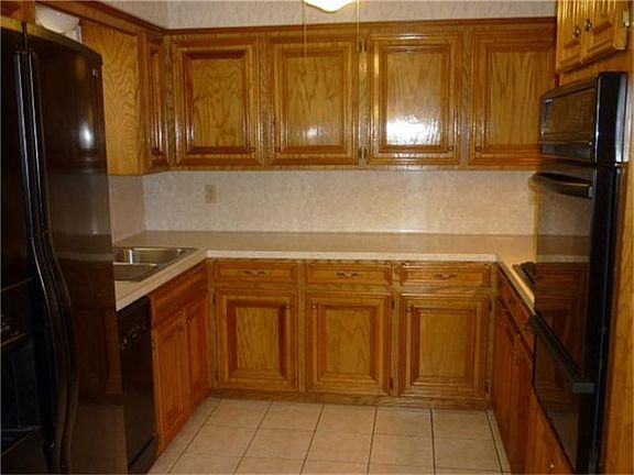 Kitchen with ample cabinets & counterspace